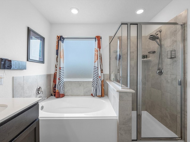 15618 Cliffside Arbor Ln, Houston, TX 77044 - full bathroom featuring a garden tub, a stall shower, vanity, and recessed lighting