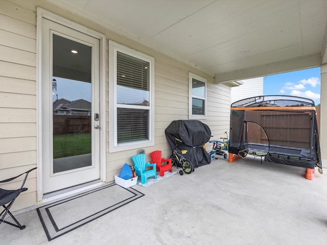 15618 Cliffside Arbor Ln, Houston, TX 77044 - view of patio featuring a trampoline
