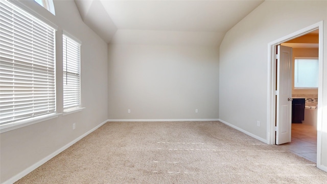 5434 Wildbrush Dr, Richmond, TX 77407 - unfurnished room with light colored carpet, vaulted ceiling, and baseboards