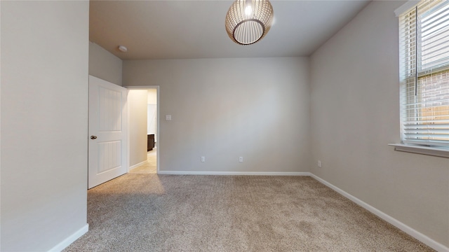 5434 Wildbrush Dr, Richmond, TX 77407 - unfurnished room with carpet floors, baseboards, and a smoke detector