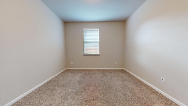 5434 Wildbrush Dr, Richmond, TX 77407 - carpeted spare room featuring baseboards