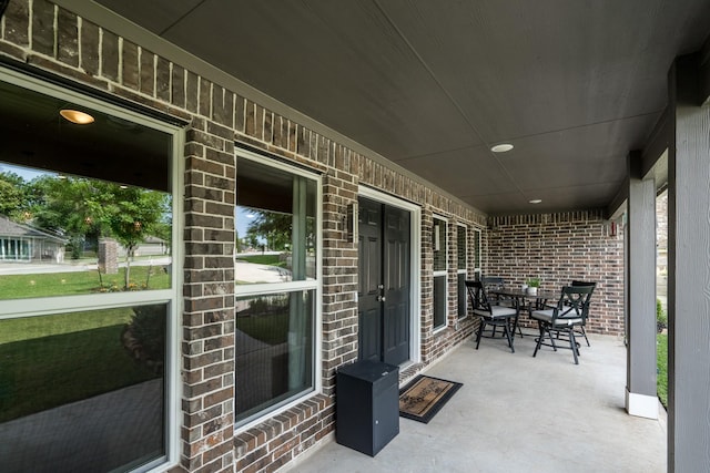 454 Cape Conroe Dr, Montgomery, TX 77356 - covered porch featuring outdoor dining area