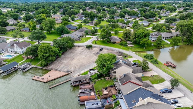 454 Cape Conroe Dr, Montgomery, TX 77356 - aerial perspective of suburban area featuring a large body of water