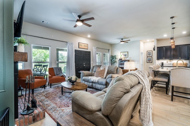 454 Cape Conroe Dr, Montgomery, TX 77356 - living area featuring ceiling fan, light wood-style floors, and recessed lighting