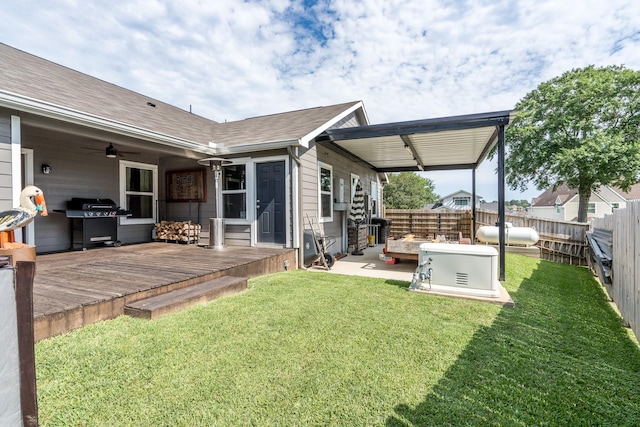 454 Cape Conroe Dr, Montgomery, TX 77356 - view of yard featuring a wooden deck and a ceiling fan