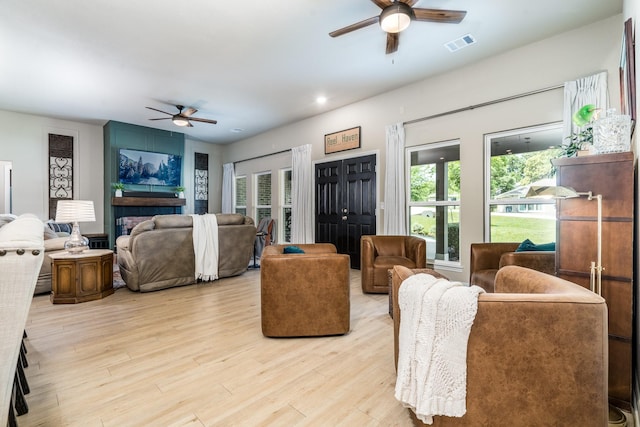 454 Cape Conroe Dr, Montgomery, TX 77356 - living area with ceiling fan and wood finished floors
