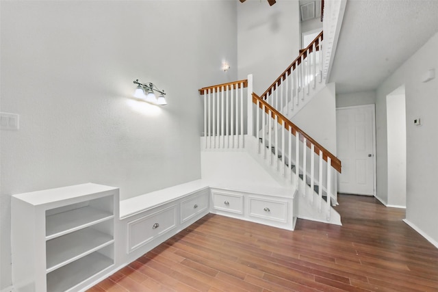 3126 Windchase Blvd Unit 421, Houston, TX 77082 - stairway featuring wood finished floors