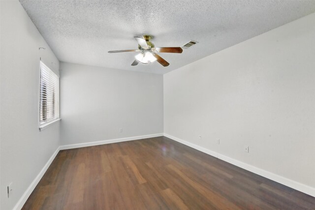 3126 Windchase Blvd Unit 421, Houston, TX 77082 - unfurnished room with a ceiling fan, wood finished floors, baseboards, and a textured ceiling