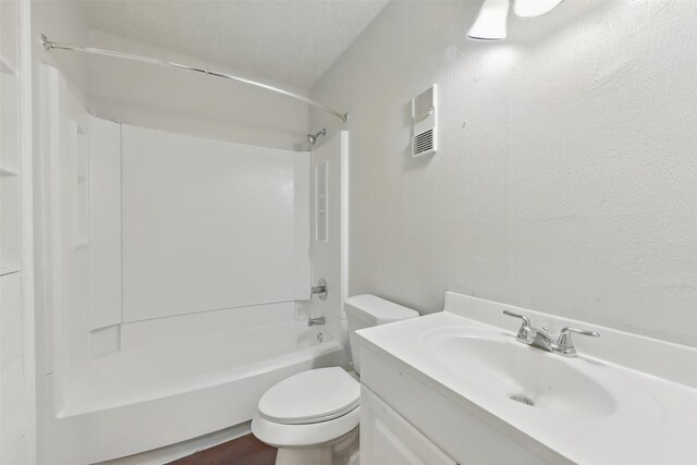 3126 Windchase Blvd Unit 421, Houston, TX 77082 - full bath featuring toilet, shower / bathtub combination, vanity, and a textured wall
