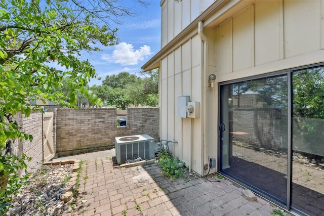 3126 Windchase Blvd Unit 421, Houston, TX 77082 - view of patio featuring central AC unit