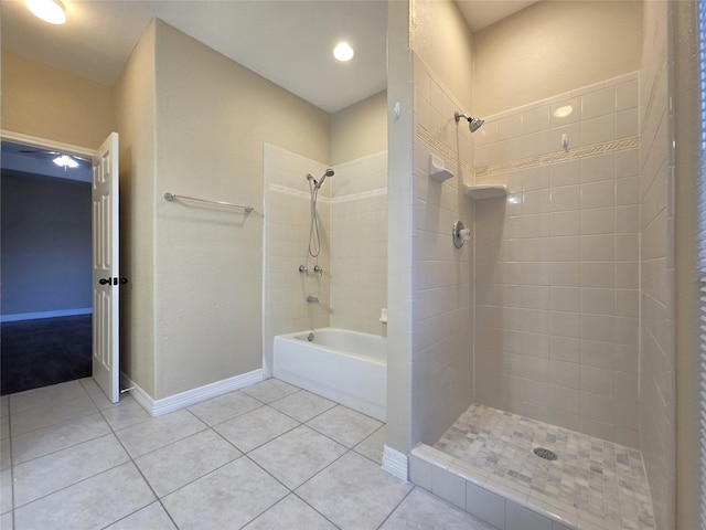 1944 Hillcroft, Prairie View, TX 77445 - full bath with tile patterned floors, baseboards, and tiled shower / bath combo