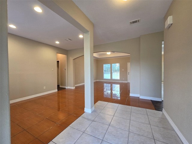 1944 Hillcroft, Prairie View, TX 77445 - spare room with tile patterned flooring, arched walkways, recessed lighting, and baseboards
