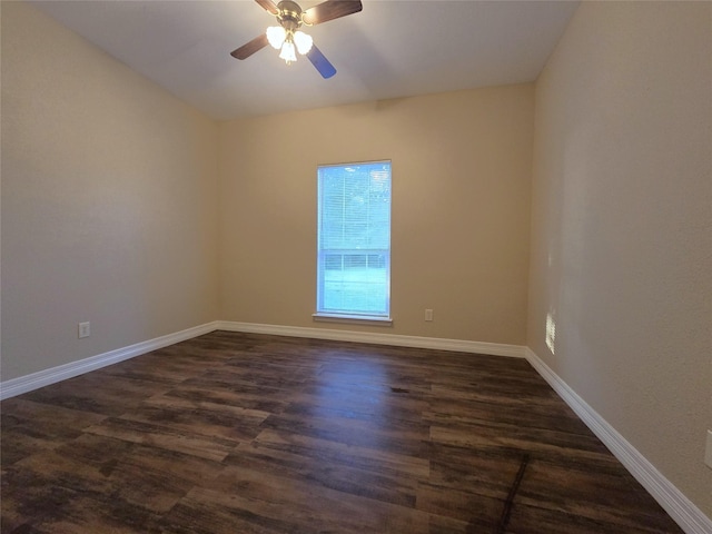 1944 Hillcroft, Prairie View, TX 77445 - empty room with baseboards, dark wood-style floors, and a ceiling fan