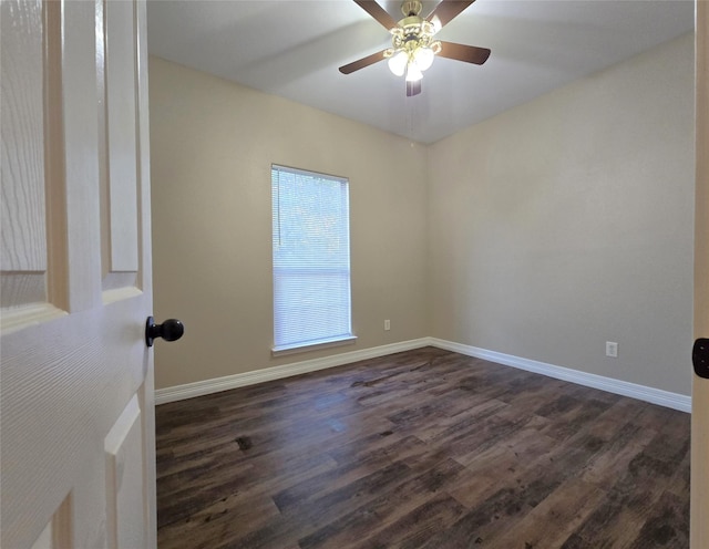 1944 Hillcroft, Prairie View, TX 77445 - unfurnished room with dark wood-style floors, baseboards, and a ceiling fan