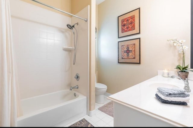 423 Hana Dr, Tiki Island, TX 77554 - bathroom with vanity, toilet, shower / bath combo with shower curtain, and tile patterned floors
