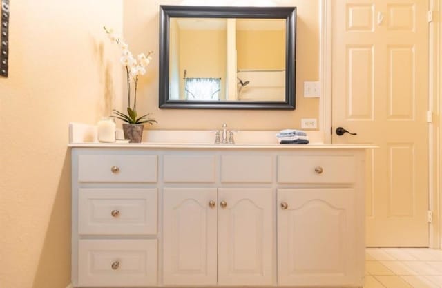 423 Hana Dr, Tiki Island, TX 77554 - bathroom featuring vanity and tile patterned flooring