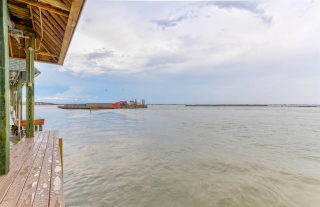 423 Hana Dr, Tiki Island, TX 77554 - dock featuring a water view