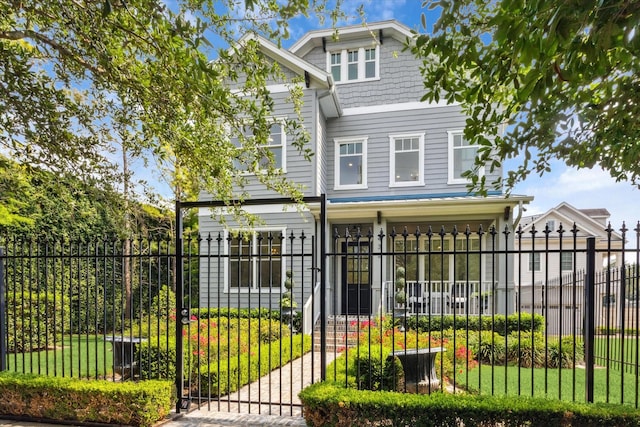 432 Marshall St, Houston, TX 77006 - back of property featuring a gate and a fenced front yard