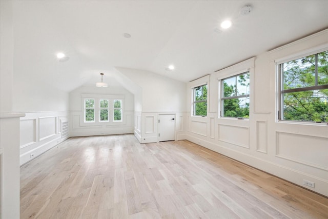 432 Marshall St, Houston, TX 77006 - interior space with a decorative wall, recessed lighting, wainscoting, wood finished floors, and vaulted ceiling