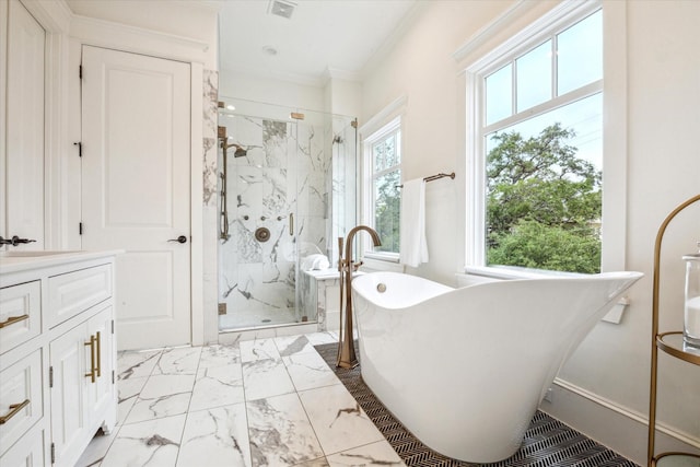432 Marshall St, Houston, TX 77006 - full bath featuring a marble finish shower, marble look tile flooring, a freestanding tub, crown molding, and vanity