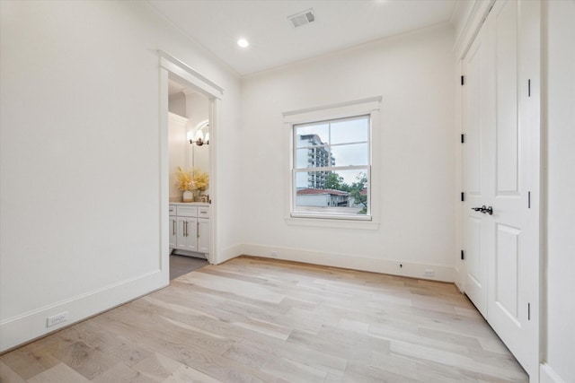 432 Marshall St, Houston, TX 77006 - unfurnished bedroom featuring ornamental molding, light wood-style floors, a chandelier, baseboards, and recessed lighting