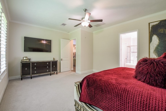 9411 Plaza Point Dr, Missouri City, TX 77459 - carpeted bedroom with ornamental molding, baseboards, ceiling fan, and ensuite bathroom