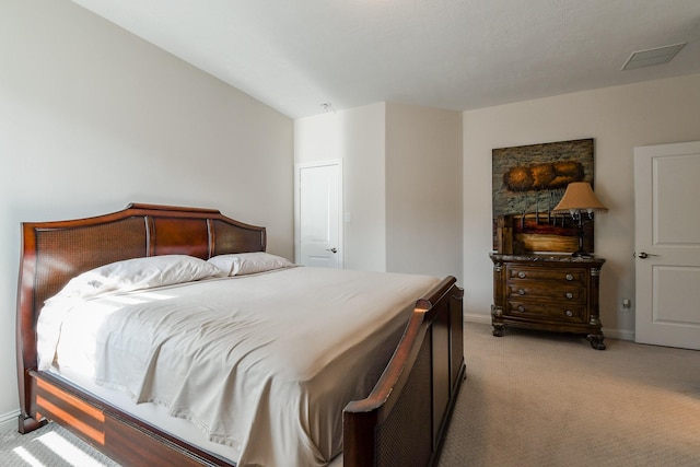 9411 Plaza Point Dr, Missouri City, TX 77459 - bedroom with light carpet and baseboards