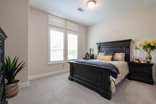9411 Plaza Point Dr, Missouri City, TX 77459 - bedroom featuring light carpet and baseboards
