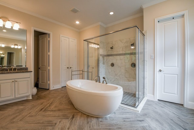 9411 Plaza Point Dr, Missouri City, TX 77459 - bathroom featuring a stall shower, vanity, a soaking tub, ornamental molding, and recessed lighting