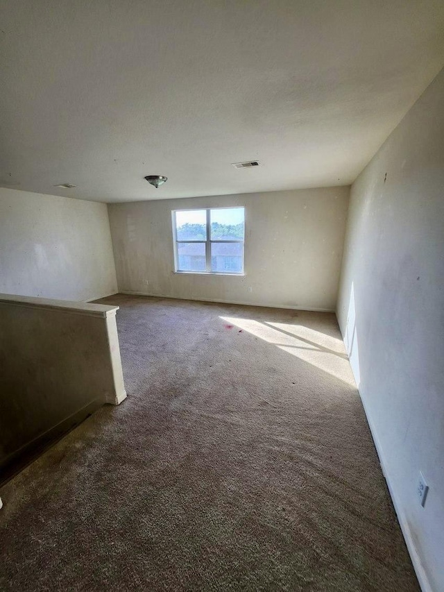 1015 Amaryllis Rd, Baytown, TX 77521 - unfurnished room with carpet flooring