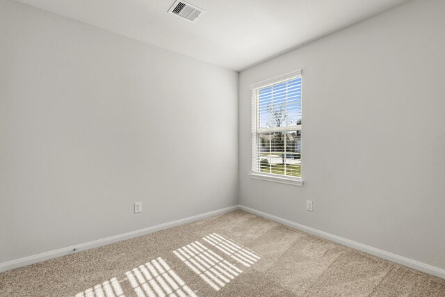 8223 Blooming Meadow Ln, Houston, TX 77016 - empty room with carpet floors and baseboards