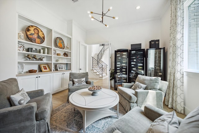 1505 Pine Chase Dr, Houston, TX 77055 - living area with a chandelier, ornamental molding, stairway, light wood-style flooring, and recessed lighting