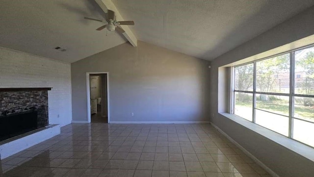 8607 Sherrywood Dr, Houston, TX 77044 - unfurnished living room with ceiling fan, light tile patterned floors, a stone fireplace, and baseboards