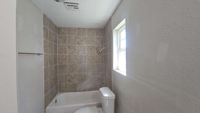 8607 Sherrywood Dr, Houston, TX 77044 - bathroom with toilet and shower / tub combination