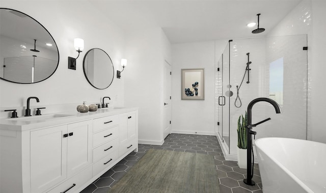 6220 Pelican Ridge Way, League City, TX 77573 - full bath with a stall shower, double vanity, a soaking tub, tile patterned flooring, and recessed lighting