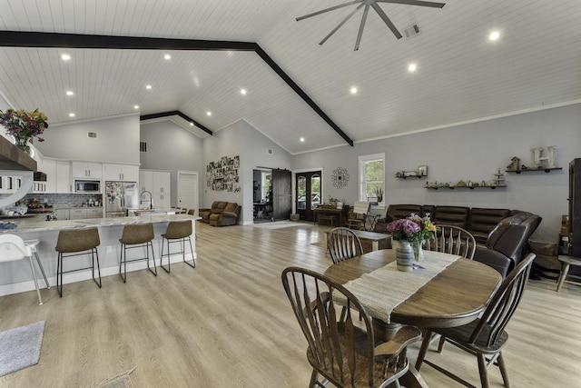 19885 Keenan Cut Off Rd, Montgomery, TX 77316 - dining room with high vaulted ceiling, recessed lighting, light wood-type flooring, and ceiling fan