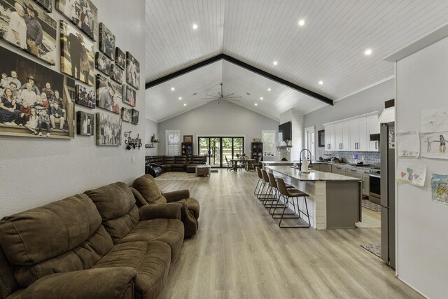 19885 Keenan Cut Off Rd, Montgomery, TX 77316 - living room with high vaulted ceiling, light wood-style flooring, recessed lighting, and ceiling fan