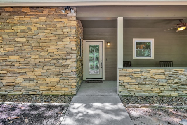 81 Baron Dr, Coldspring, TX 77331 - entrance to property featuring ceiling fan and stone siding