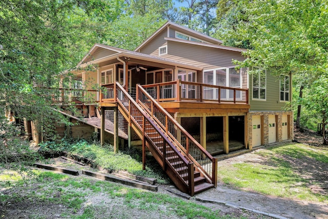81 Baron Dr, Coldspring, TX 77331 - back of house featuring ceiling fan, an attached garage, stairs, a deck, and dirt driveway