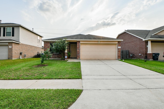 2739 Mustang Hill Ln, Katy, TX 77449 - view of front of property with brick siding, a front yard, concrete driveway, and an attached garage
