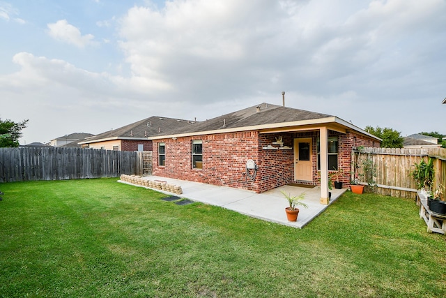 2739 Mustang Hill Ln, Katy, TX 77449 - rear view of property featuring a patio and brick siding