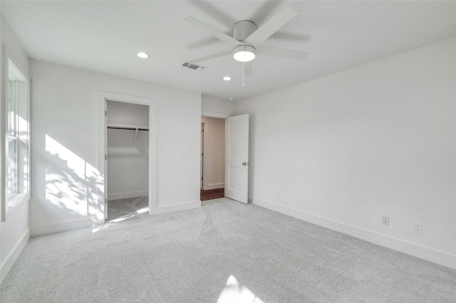 293 S College St, La Grange, TX 78945 - unfurnished bedroom featuring recessed lighting, light carpet, baseboards, a closet, and ceiling fan