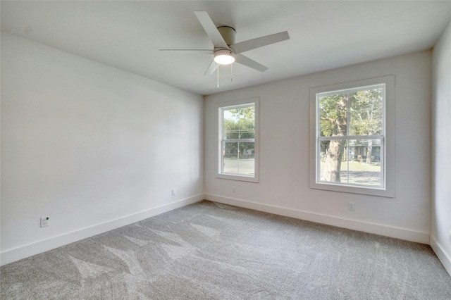 293 S College St, La Grange, TX 78945 - empty room with light carpet, baseboards, and ceiling fan