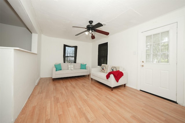7013 Kittridge St, Houston, TX 77028 - living room featuring light wood finished floors and a ceiling fan