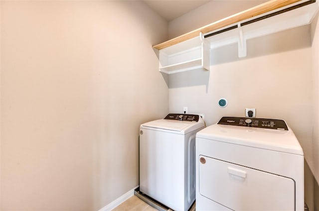 4209 Colony Pines Ln, Houston, TX 77080 - washroom with washing machine and clothes dryer and baseboards