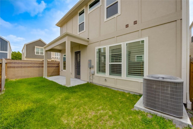 4209 Colony Pines Ln, Houston, TX 77080 - back of house with cooling unit and a patio