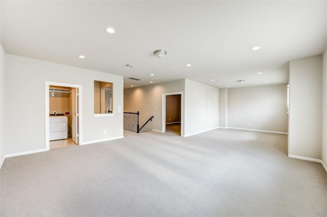 4209 Colony Pines Ln, Houston, TX 77080 - empty room featuring washer / clothes dryer, light colored carpet, baseboards, and recessed lighting