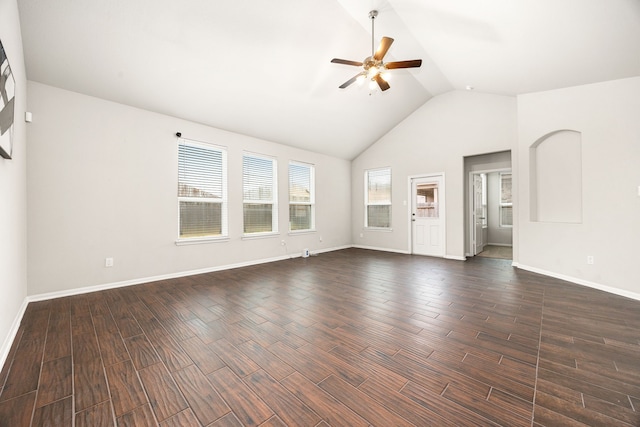 4323 Wyanngate Dr, Spring, TX 77373 - unfurnished living room with a ceiling fan, vaulted ceiling, dark wood-style floors, and baseboards