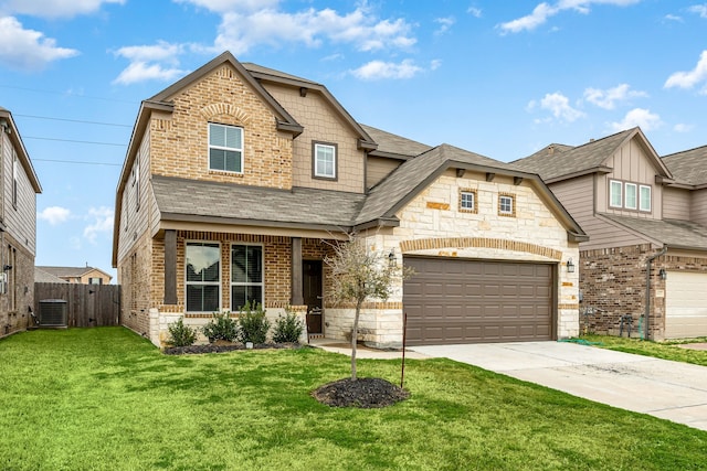 4323 Wyanngate Dr, Spring, TX 77373 - view of front of home featuring driveway, brick siding, central air condition unit, a shingled roof, and stone siding