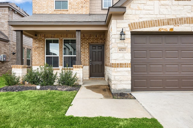 4323 Wyanngate Dr, Spring, TX 77373 - doorway to property with a porch, stone siding, concrete driveway, and an attached garage